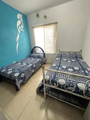 Cama o camas de una habitación en Departamento en Fraccionamiento