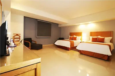 Cama o camas de una habitación en HB Córdoba
