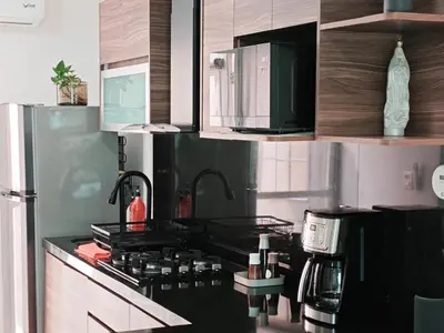 Una cocina o zona de cocina en Cerca de Salones de Fiesta, con Alberca, AC e Internet