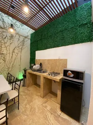 Una cocina o zona de cocina en Casa de la Abuelita