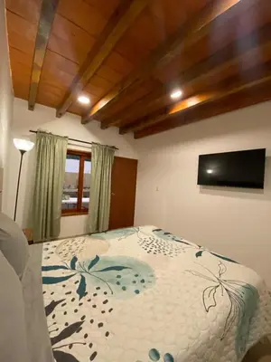 Cama o camas de una habitación en Casa de la Abuelita