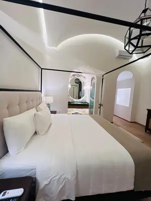Cama o camas de una habitación en Casa Haus Hotel Puebla Centro Histórico