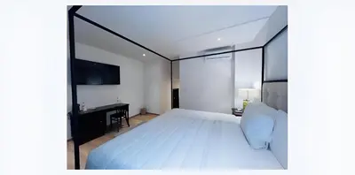 Cama o camas de una habitación en Casa Haus Hotel Puebla Centro Histórico