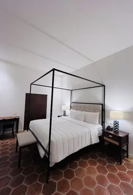 Cama o camas de una habitación en Casa Haus Hotel Puebla Centro Histórico