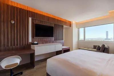 Cama o camas de una habitación en Radisson Puebla Angelopolis