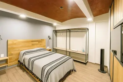 Cama o camas de una habitación en Casa Layu Oaxaca