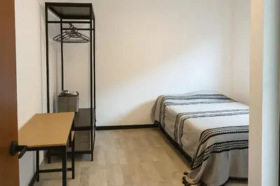 Cama o camas de una habitación en Casa Layu Oaxaca