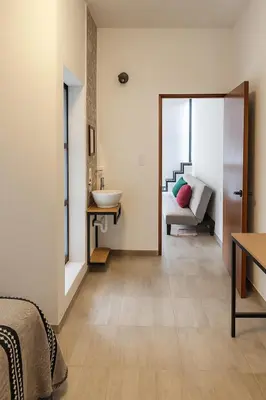 Cama o camas de una habitación en Casa Layu Oaxaca