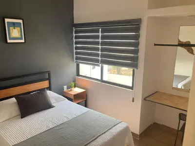 Cama o camas de una habitación en Condominio cerca salida norte Lomas de Cocoyoc