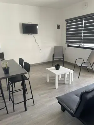 Una televisión o centro de entretenimiento en Condominio cerca salida norte Lomas de Cocoyoc