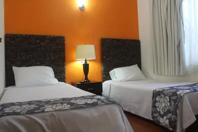Cama o camas de una habitación en Villas Tecuanapan