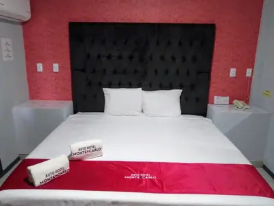 Cama o camas de una habitación en AUTO HOTEl MONTE CARLO