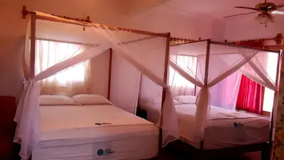 Cama o camas de una habitación en Cabañas Telayú