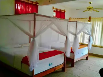 Cama o camas de una habitación en Cabañas Telayú