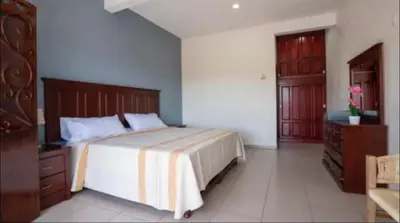 Cama o camas de una habitación en Palenque El Rey de Matatlán