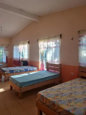 Cama o camas de una habitación en Jardín de los Anturios, Xico