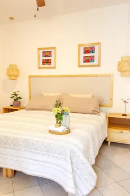 Cama o camas de una habitación en Casa Cataleya Refugio Bohemio y Romántico en Oaxaca