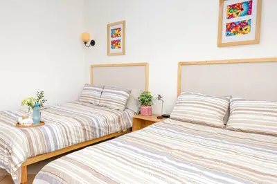 Cama o camas de una habitación en Casa Cataleya Refugio Bohemio y Romántico en Oaxaca