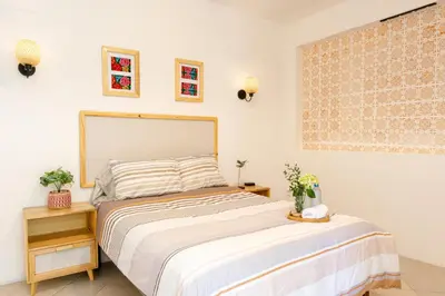 Cama o camas de una habitación en Casa Cataleya Refugio Bohemio y Romántico en Oaxaca