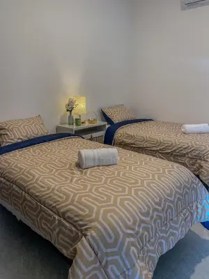 Cama o camas de una habitación en Paraíso Costero - playa y carnaval cerca