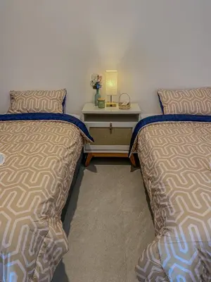 Cama o camas de una habitación en Paraíso Costero - playa y carnaval cerca