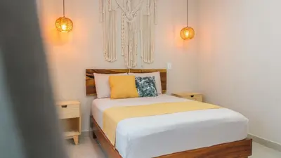 Cama o camas de una habitación en Hotel Casa Origen Huatulco