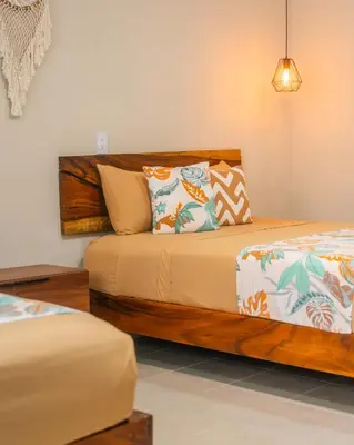 Cama o camas de una habitación en Hotel Casa Origen Huatulco