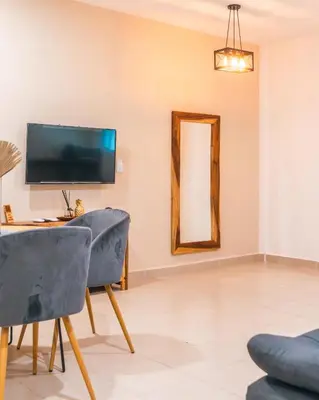 Una televisión o centro de entretenimiento en Hotel Casa Origen Huatulco