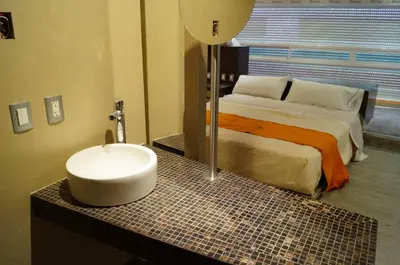 Cama o camas de una habitación en Hotel Amala
