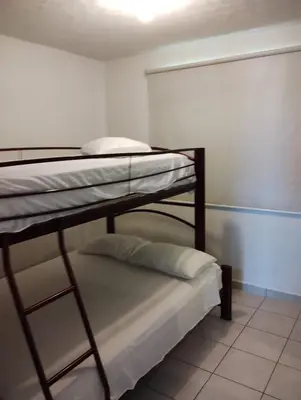 Cama o camas de una habitación en Exclusivo Departamento Zona Diamante