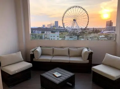 Zona de estar de Penthouse in front of Estrella de Puebla 16 guest
