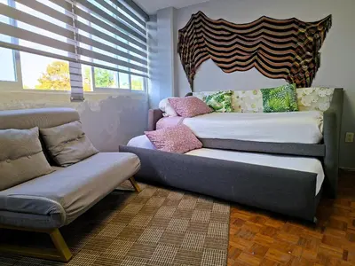 Cama o camas de una habitación en Mexicaníssima 4BR, 4 to 11 guests in Coyoacán