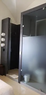 Un baño de Marialicia Suites, Hotel Boutique