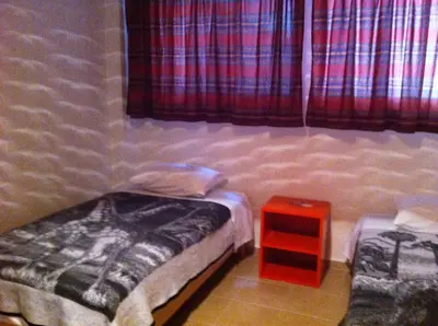 Cama o camas de una habitación en Hotel Centro Diana