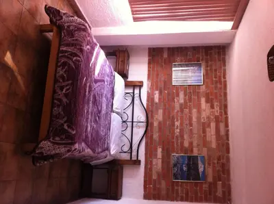 Cama o camas de una habitación en Hotel Centro Diana