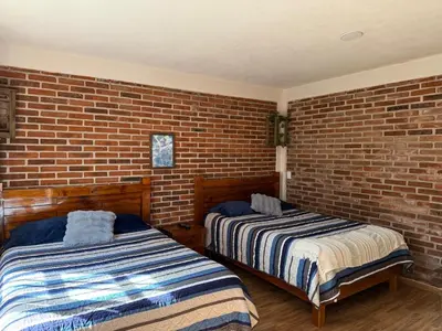 Cama o camas de una habitación en Hospedaje Vista San Carlos