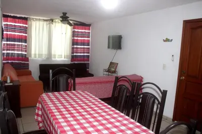 Una televisión o centro de entretenimiento en Departamento bonito en Huatulco
