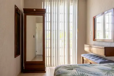 Cama o camas de una habitación en New Acapulco Retreat Garden Pool & Gym