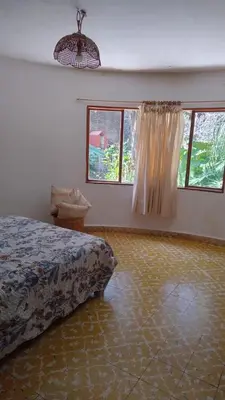 Cama o camas de una habitación en Linda Casa en Tepoztlan centro 1