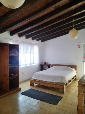 Cama o camas de una habitación en Linda casa en Tepoztlan centro 2