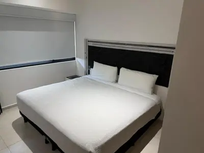 Cama o camas de una habitación en Acapulco Brake Rental