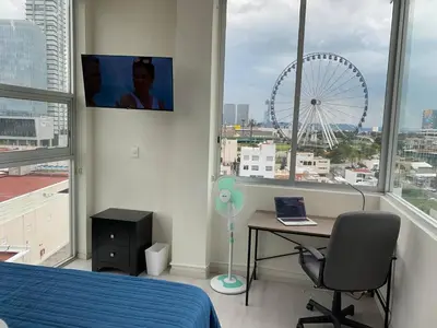 Una televisión o centro de entretenimiento en NUEVO Penthouse para 8 en la Estrella de Puebla