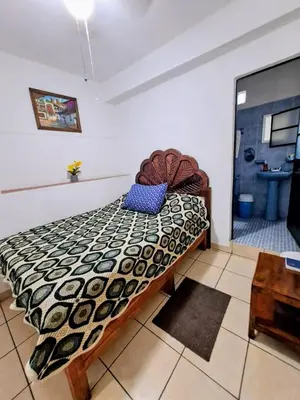 Cama o camas de una habitación en Hotel Las Palomitas