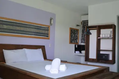 Cama o camas de una habitación en Hotel Cristal Mazunte