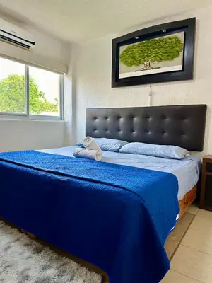 Cama o camas de una habitación en Departamento en Pb frente a la alberca
