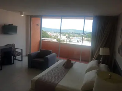 Cama o camas de una habitación en Hotel de Cuautla