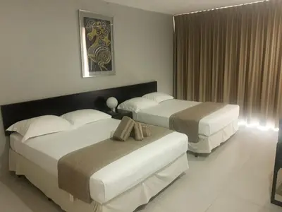Cama o camas de una habitación en Hotel de Cuautla
