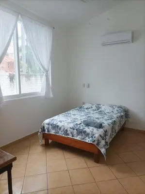 Cama o camas de una habitación en Casa Fefe Huatulco