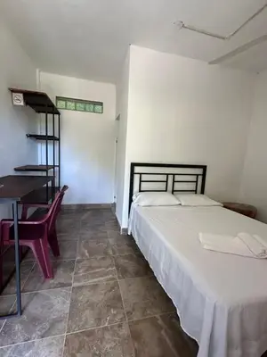Cama o camas de una habitación en Casa Nayeeche, Hospedaje & Dive Center