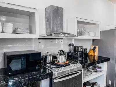 Una cocina o zona de cocina en Villa a 5 min a playa Zicatela con Alberca,Terraza y Starlink